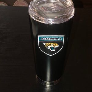 Jacksonville Jaguars coffee cup.
